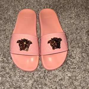 Versace pool slides … fits small size 37.5 wore 4x